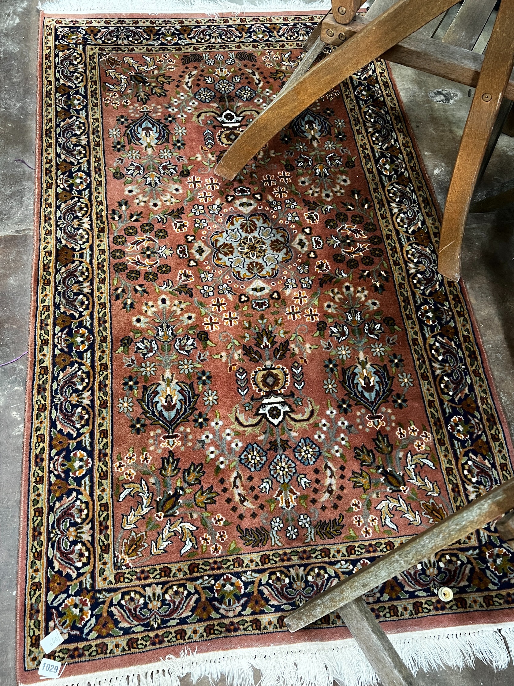 A North West Persian peach ground rug, 160 x 93cm